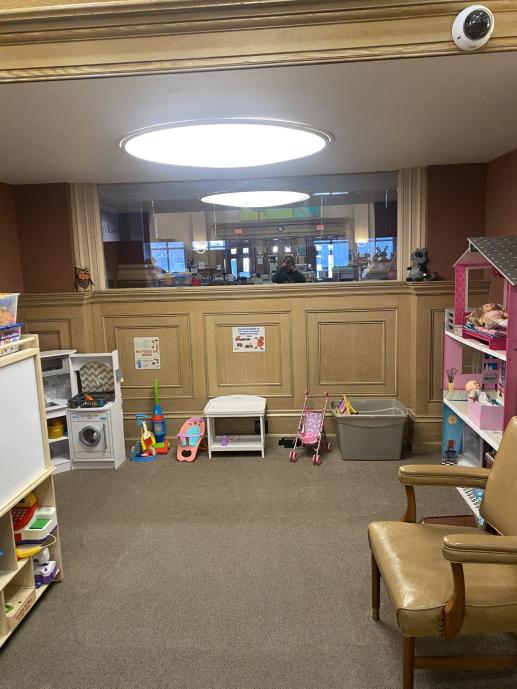 Imaginative Play Area with Play Kitchen, mirror, play cleaning supplies, and play stroller