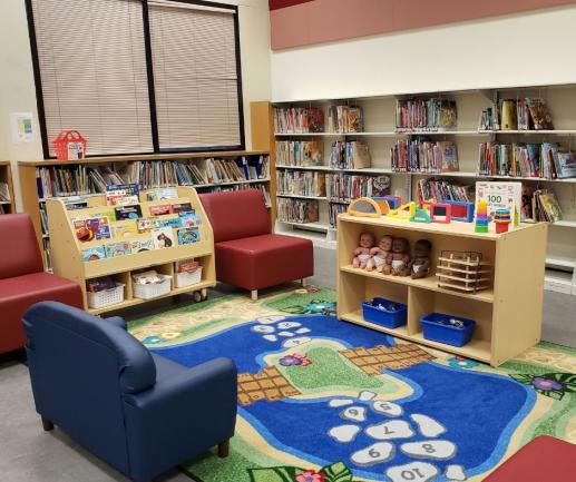 Family Place seating area with play rug for children