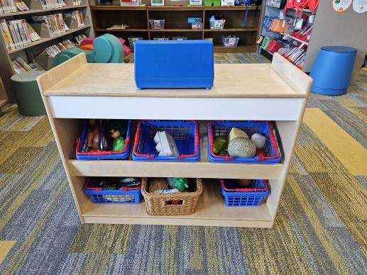 Family Place play area with dramatic play market.