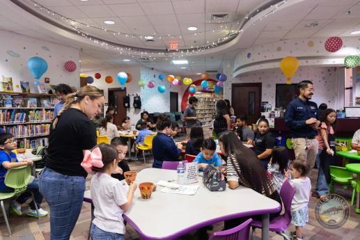 Families attending our a homeschool handout session where children where learning how to grow their own pumpkins, resources were provided by our city's urban ecologist and our inhouse seed library. 