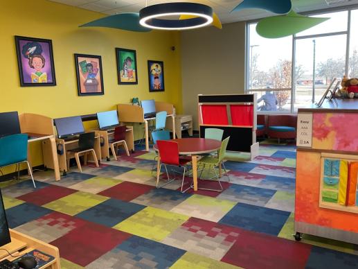 Children's Area featuring computers and puppet booth