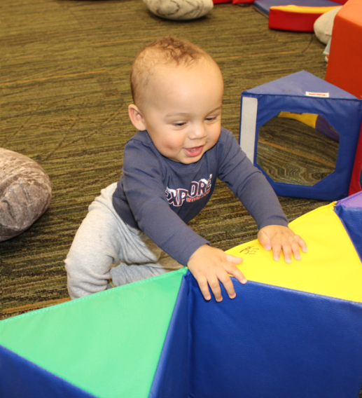 Baby enjoying youth programming