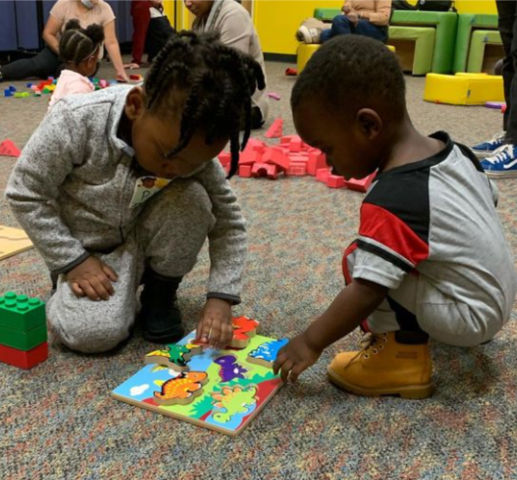children playing with puzzles