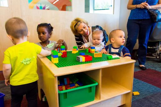 Families playing with Duplos.