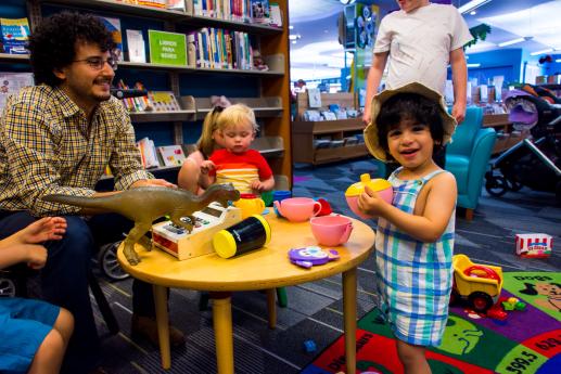Family engaging in dramatic play together.