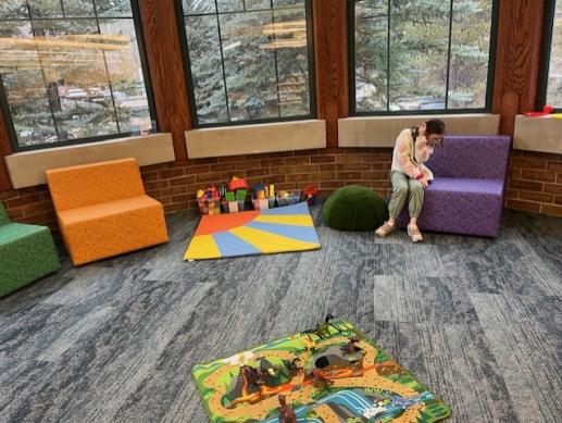 A child plays in the Family Place area 