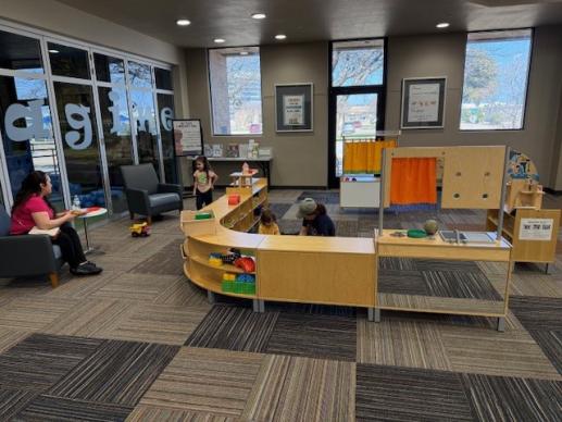 Families playing at the Main Library