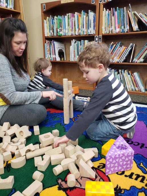 Family playing with blocks