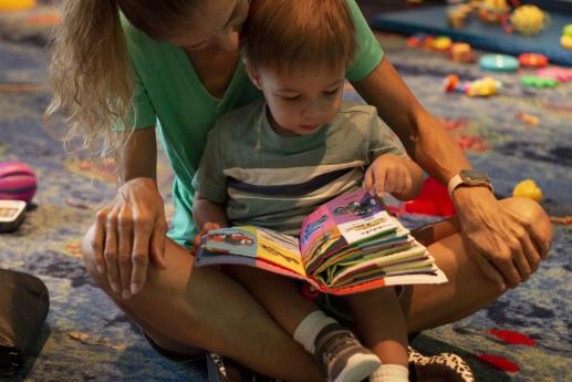 Mom and child reading at Allen Public Library's Parent Child Playtime