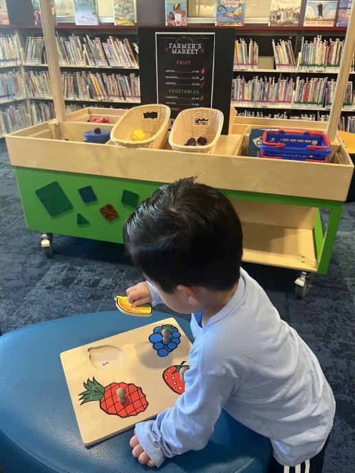 Child playing with puzzles.