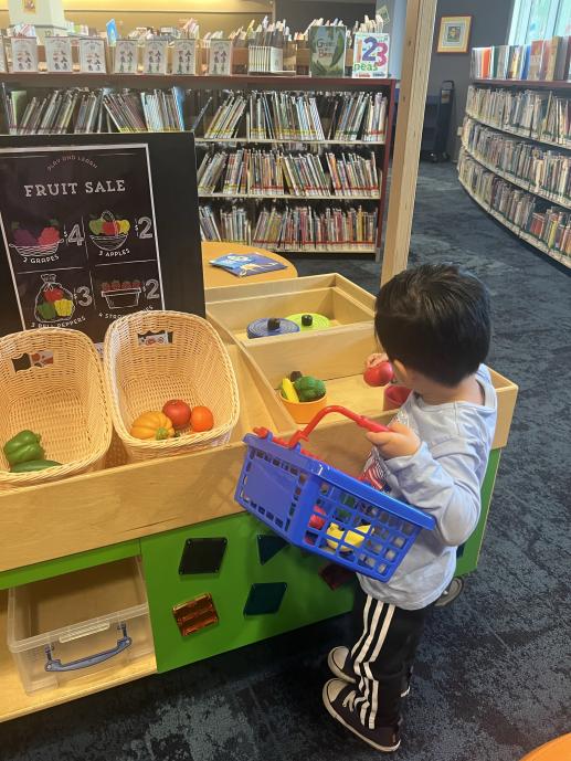 Child engaging with imaginative play.