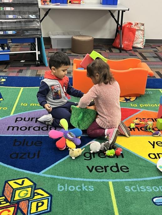 Two children playing in FP workshop