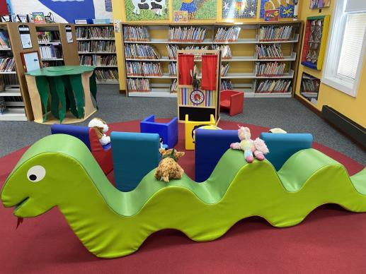 Kid's room with soft, wipeable furniture and colorful toys that simulate imaginative plan.