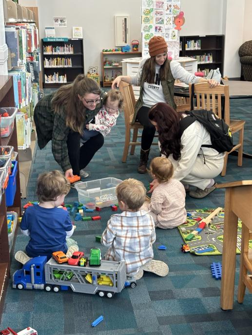 Mamas and Babies Playing In the Children's Room.
