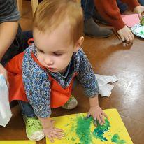 Tiny one finger painting during Stay and Play.