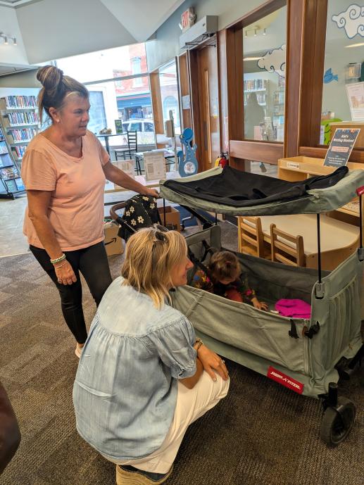 Our speech therapist talking to our little family place patron as they are leaving