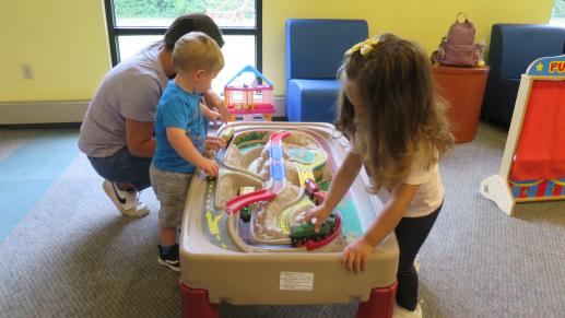 Children enjoying our very popular train table.