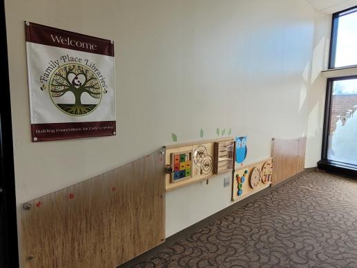Wall with manipulative interactive children's toys
