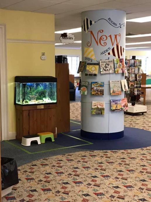 Fish tank and new book display column in Children's Department.