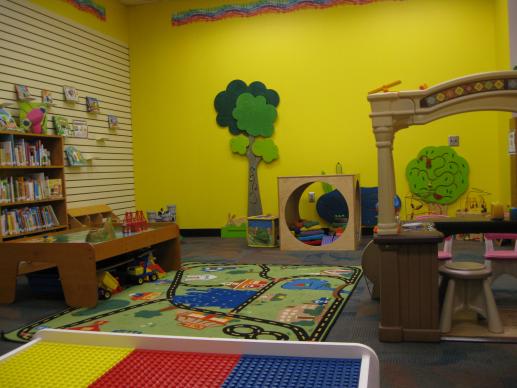 Family Place Library children's area for play with books and manipulatives.