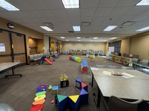 meeting space with children's play area set up for play workshop