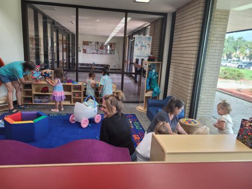 Several families and children playing together