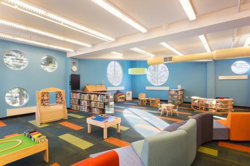 empty children's space at the middle country library. puppets, trains, seating