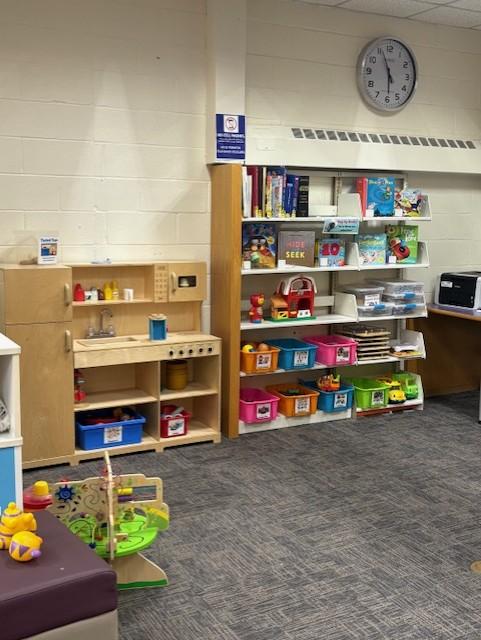 free play area with kitchen and toys