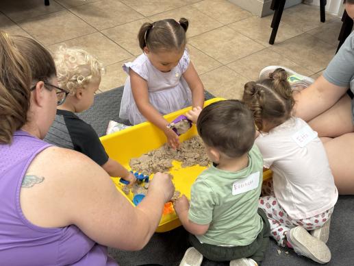 Playing with kinetic sand during PCW.