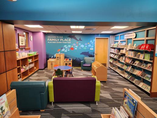 Full photo of Family Place area including toys, the parenting collection, and materials.