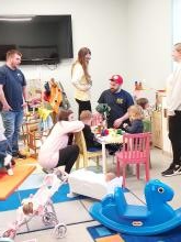 Children and their parents having dinner in our kitchen area